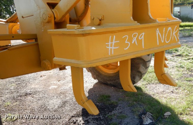 image for item DM2988 1990 John Deere 670B  motor grader