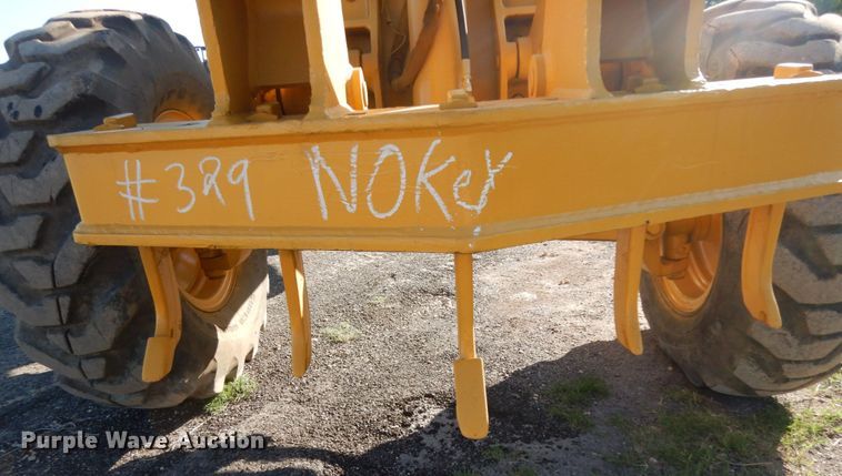 image for item DM2988 1990 John Deere 670B  motor grader