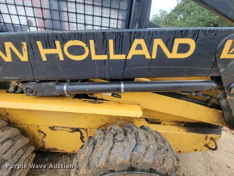 image for item IF9931 1998 New Holland LX885  skid steer loader