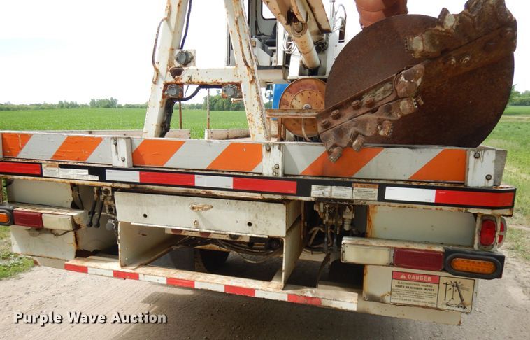 image for item IL9852 2000 Sterling L-Line  digger derrick truck