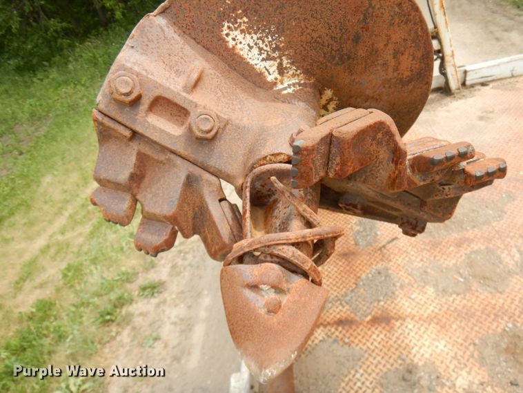 image for item IL9852 2000 Sterling L-Line  digger derrick truck