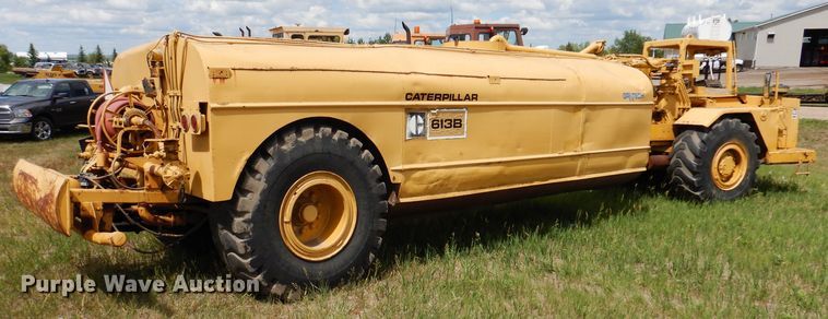 image for item IQ9652 1978 Caterpillar 613B  water wagon