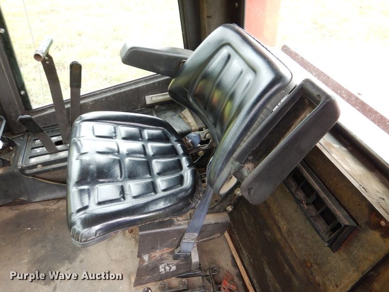 image for item DL3233 1983 Hesston 6450  windrower