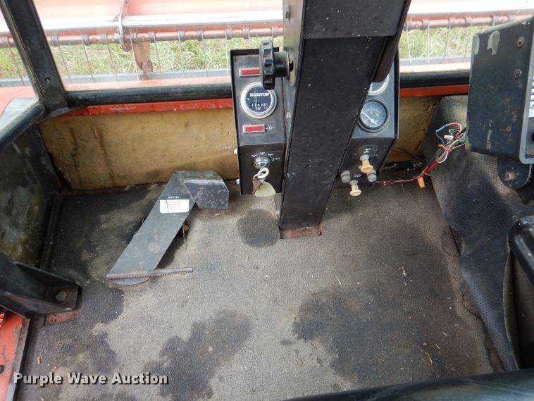 image for item DL3233 1983 Hesston 6450  windrower