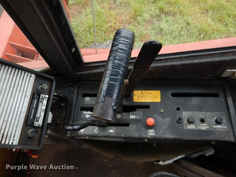 image for item DL3233 1983 Hesston 6450  windrower