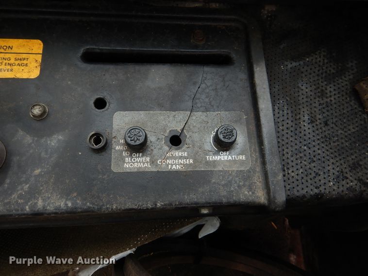 image for item DL3233 1983 Hesston 6450  windrower