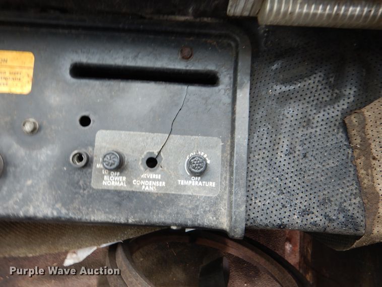 image for item DL3233 1983 Hesston 6450  windrower