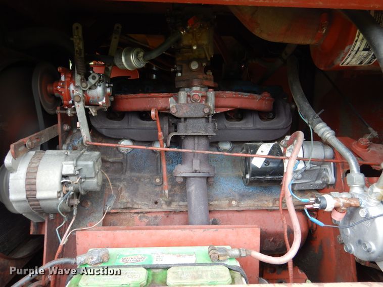 image for item DL3233 1983 Hesston 6450  windrower