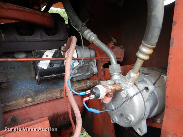 image for item DL3233 1983 Hesston 6450  windrower