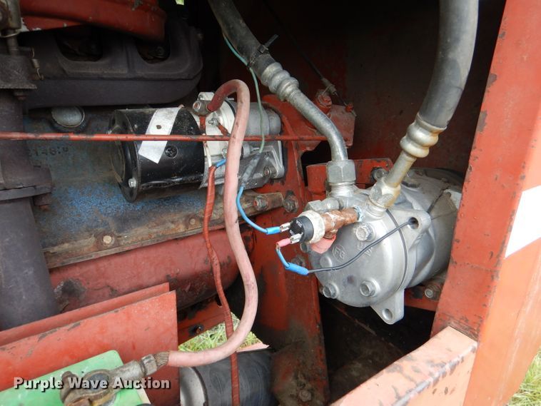 image for item DL3233 1983 Hesston 6450  windrower