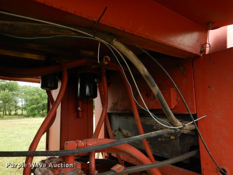 image for item DL3233 1983 Hesston 6450  windrower