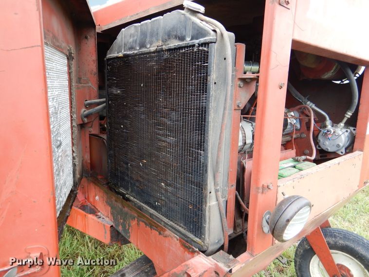 image for item DL3233 1983 Hesston 6450  windrower