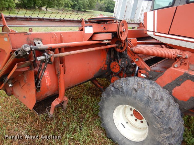 image for item DL3233 1983 Hesston 6450  windrower