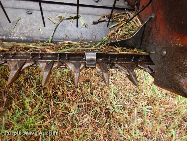 image for item DL3233 1983 Hesston 6450  windrower