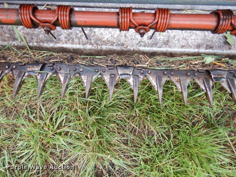 image for item DL3233 1983 Hesston 6450  windrower