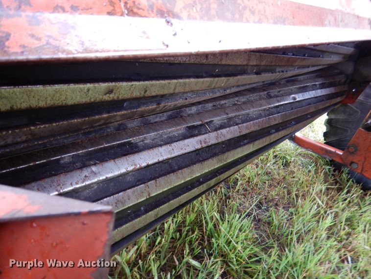 image for item DL3233 1983 Hesston 6450  windrower