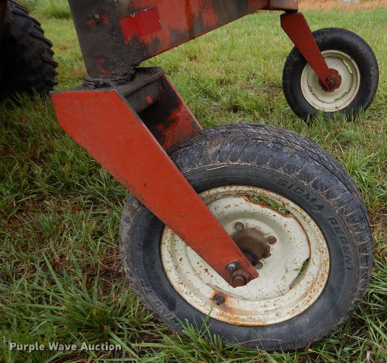 image for item DL3233 1983 Hesston 6450  windrower