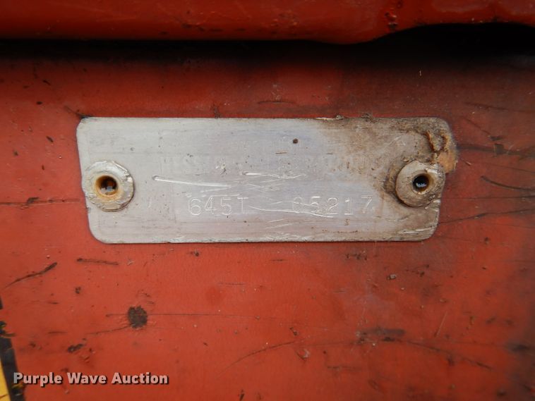 image for item DL3233 1983 Hesston 6450  windrower