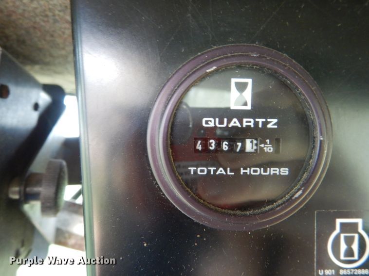 image for item DL3323 1999 New Holland TR99  combine