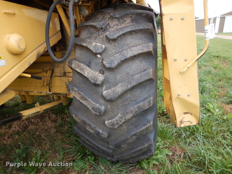 image for item DL3323 1999 New Holland TR99  combine