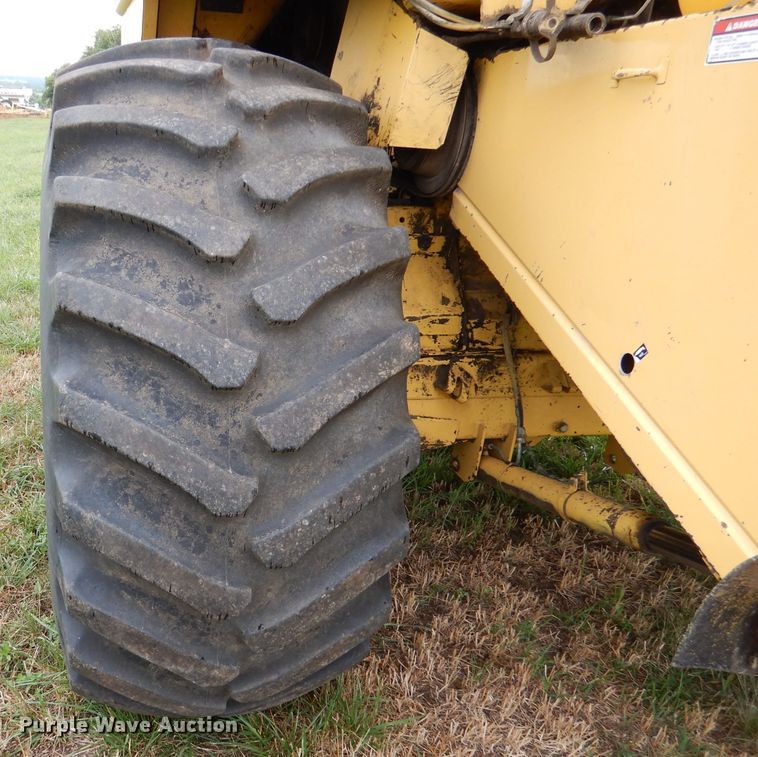 image for item DL3323 1999 New Holland TR99  combine