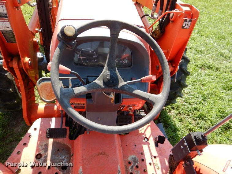 image for item DL3331 Kubota M7040  MFWD tractor