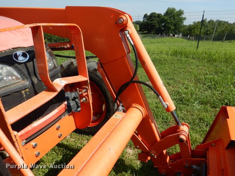 image for item DL3331 Kubota M7040  MFWD tractor