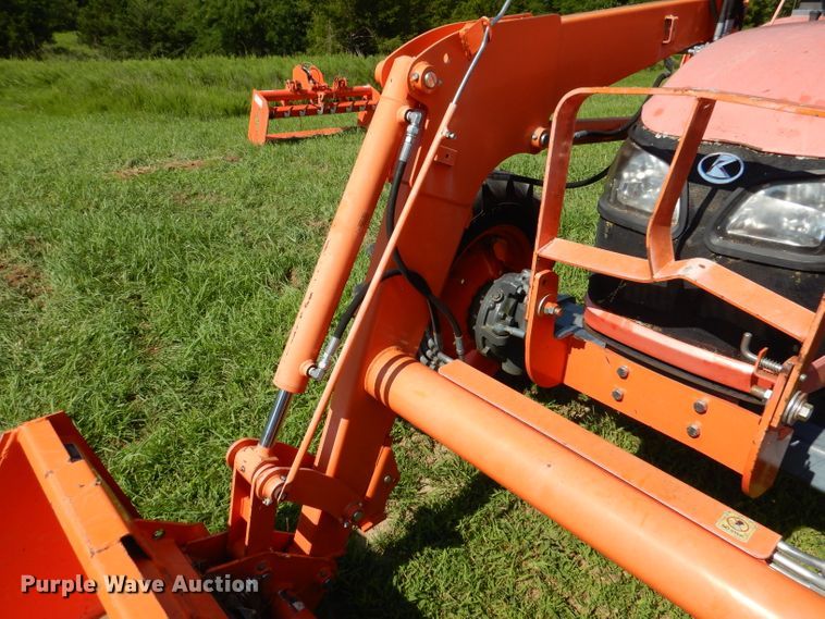 image for item DL3331 Kubota M7040  MFWD tractor