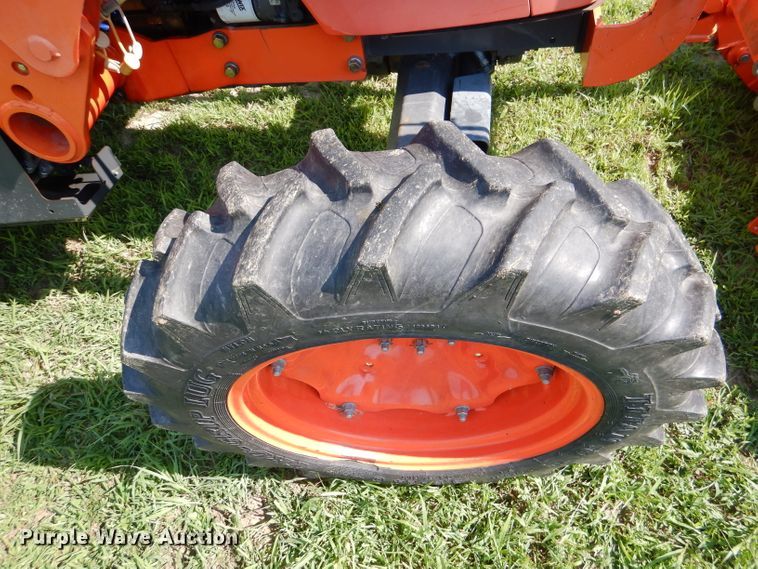 image for item DL3331 Kubota M7040  MFWD tractor