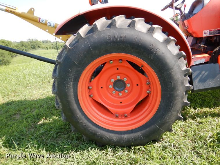 image for item DL3331 Kubota M7040  MFWD tractor