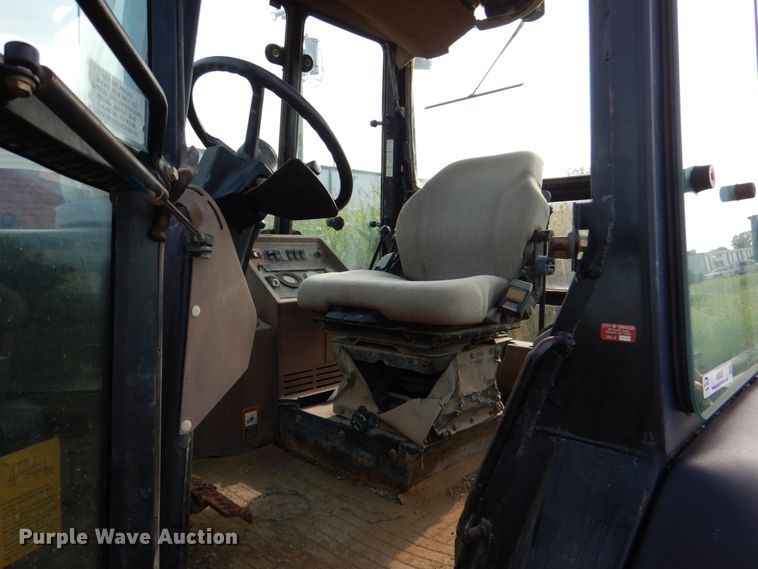 image for item IA9955 2000 John Deere 310SE  backhoe