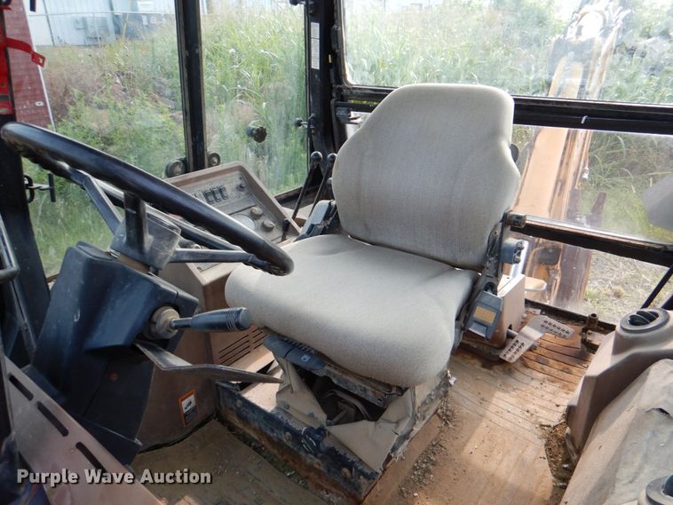 image for item IA9955 2000 John Deere 310SE  backhoe