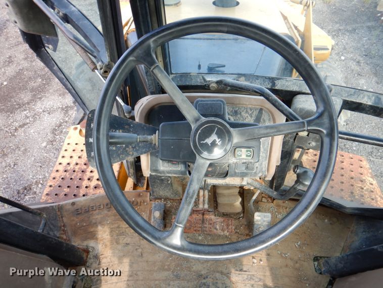 image for item IA9955 2000 John Deere 310SE  backhoe