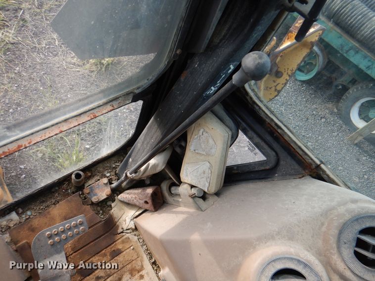 image for item IA9955 2000 John Deere 310SE  backhoe