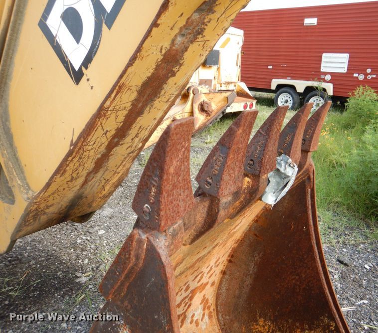 image for item IA9955 2000 John Deere 310SE  backhoe