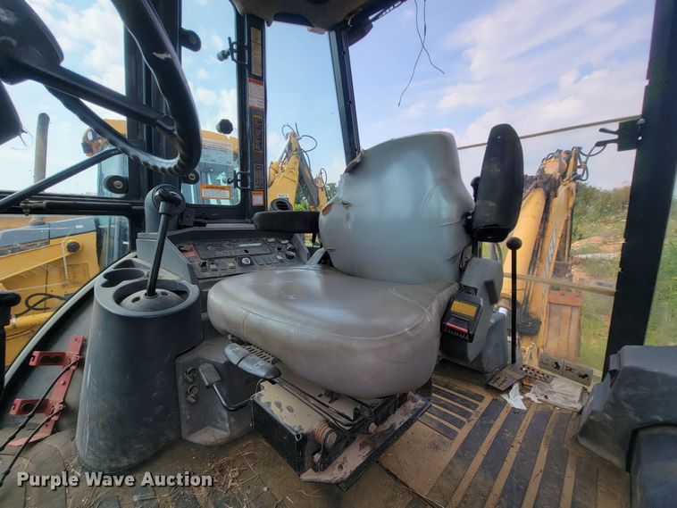 image for item IF9955 2002 John Deere 310SG  backhoe