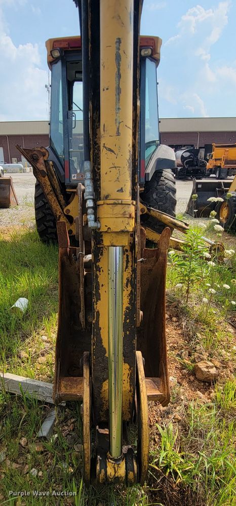 image for item IF9955 2002 John Deere 310SG  backhoe