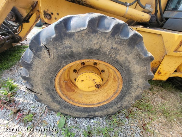 image for item IF9955 2002 John Deere 310SG  backhoe