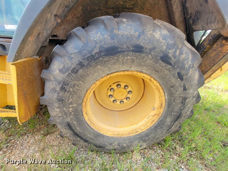 image for item IF9955 2002 John Deere 310SG  backhoe