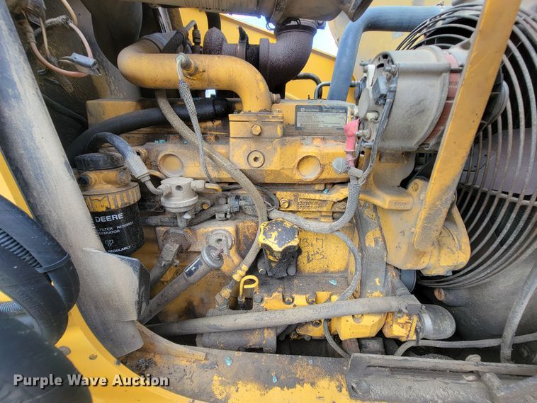 image for item IF9956 2004 John Deere 310SG  backhoe