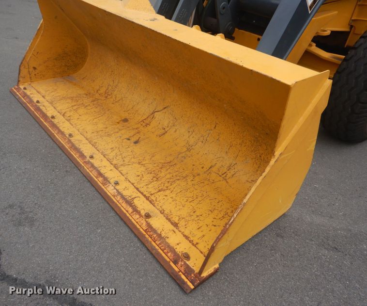 image for item IT9235 2015 John Deere 410L  backhoe