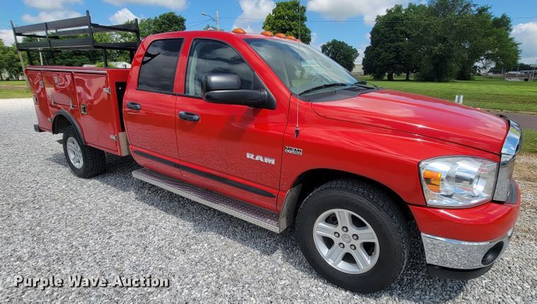 image for item IF9971 2008 Dodge Ram 1500  Quad Cab utility bed pickup truck