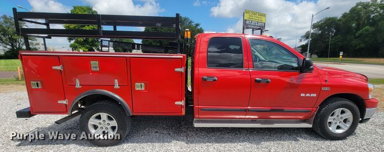 image for item IF9971 2008 Dodge Ram 1500  Quad Cab utility bed pickup truck