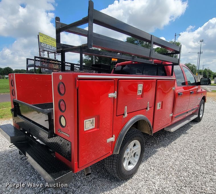 image for item IF9971 2008 Dodge Ram 1500  Quad Cab utility bed pickup truck