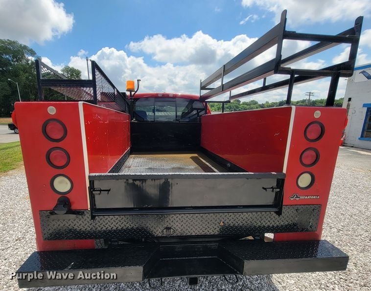 image for item IF9971 2008 Dodge Ram 1500  Quad Cab utility bed pickup truck