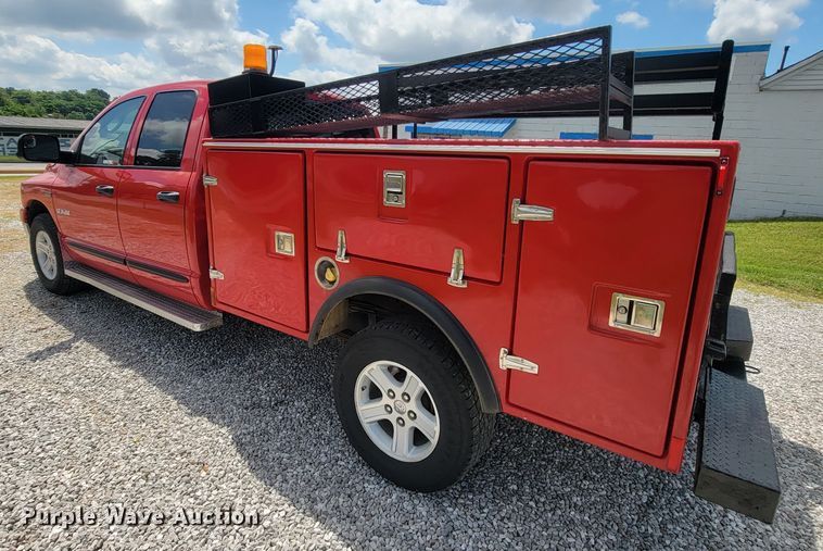 image for item IF9971 2008 Dodge Ram 1500  Quad Cab utility bed pickup truck