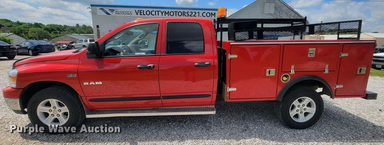 image for item IF9971 2008 Dodge Ram 1500  Quad Cab utility bed pickup truck