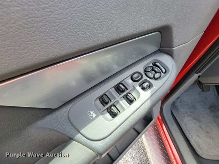 image for item IF9971 2008 Dodge Ram 1500  Quad Cab utility bed pickup truck