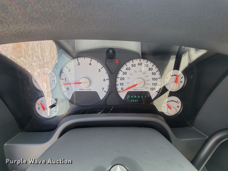 image for item IF9971 2008 Dodge Ram 1500  Quad Cab utility bed pickup truck