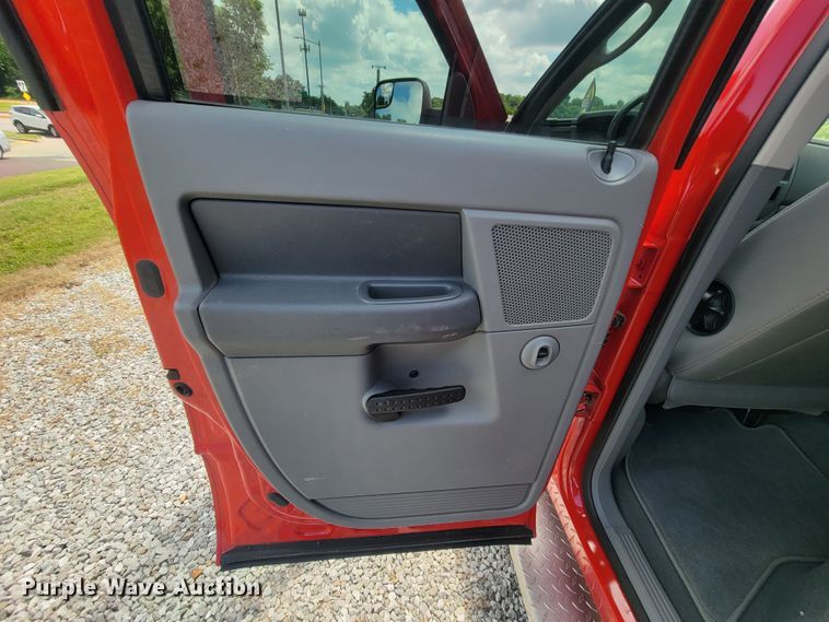 image for item IF9971 2008 Dodge Ram 1500  Quad Cab utility bed pickup truck